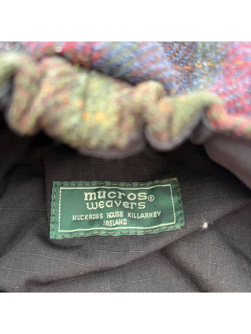 Mucros Weavers Newsboy Cap in Multi Plaid Wool with Black Flower Accent